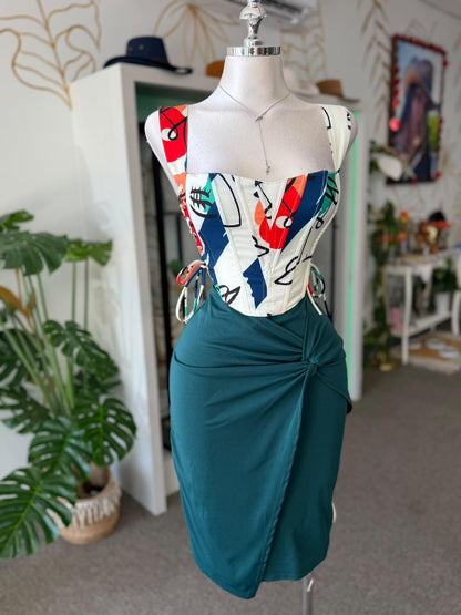 Falda Midi Verde Teal con Nudo al Frente